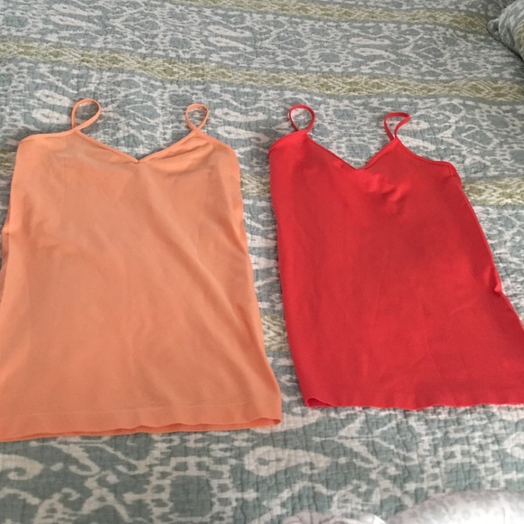 Tanks (Dark and light orange) size is M/L