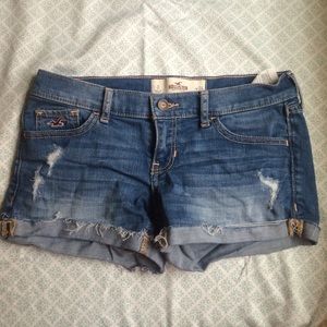 Distressed denim shorts