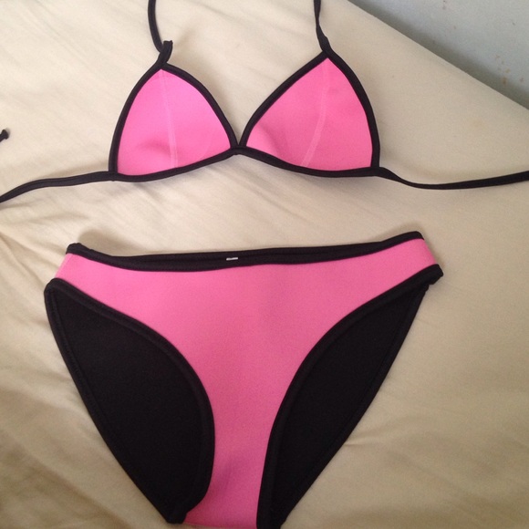 Not authentic. Triangl swimwear bathing suit.
