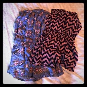 Two rompers. One size small, one size medium.