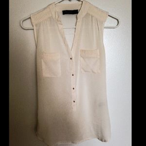 Cream v-neck top with buttons and pretty details