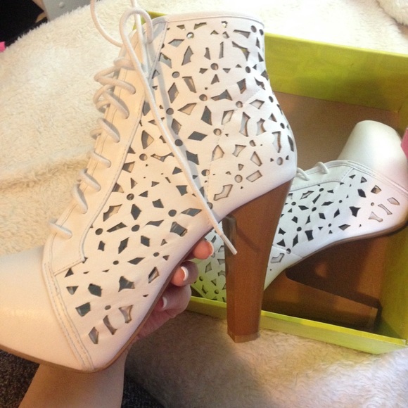White heeled boot