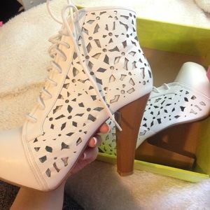 White heeled boot