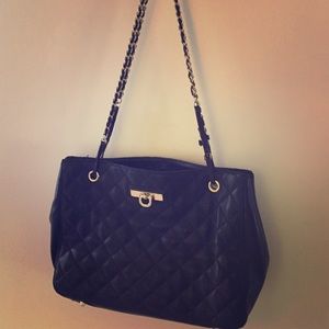 DKNY black quilted purse with gold chain straps