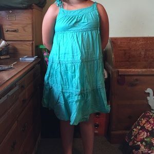 Teal blue dress with flower designs