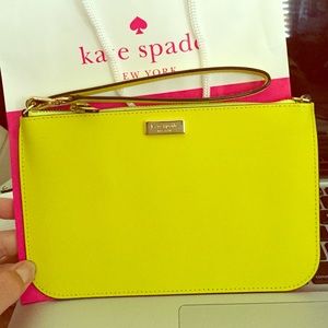 NWT kate spade neon yellow wristlet!!