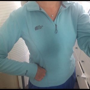 The North Face light teal half zip fleece sweater