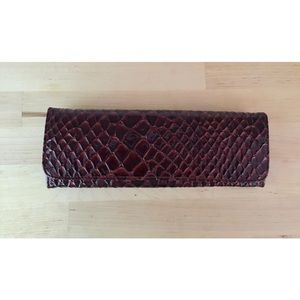 Big Buddha brown snakeskin-textured clutch