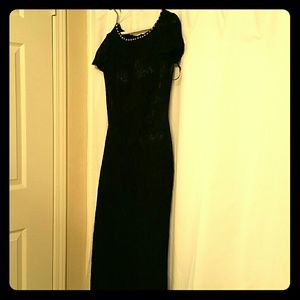 Black lace dress,  diamonds around the neck line,