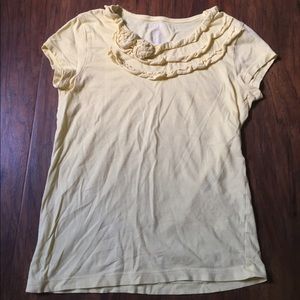 yellow top with ruffled flowers