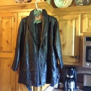Genuine leather, lining is polyester.