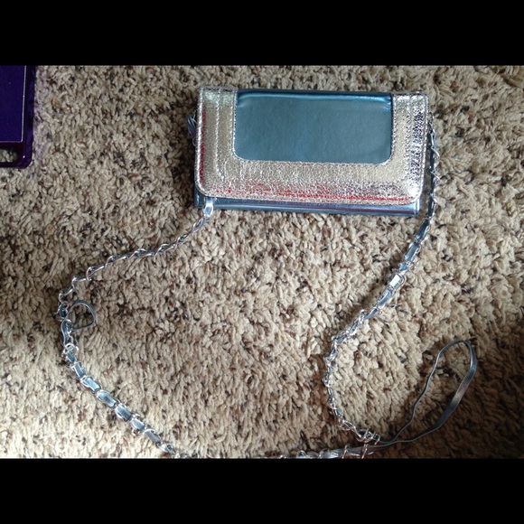 Light blue wallet, phones case and wristlet