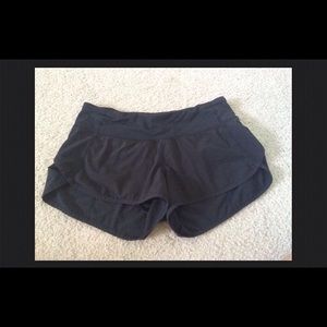 Black 4 way stretch lululemon shorts