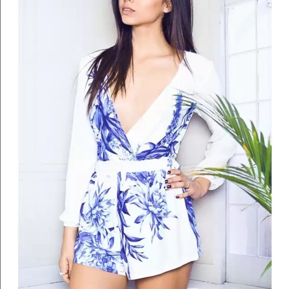 Blue floral romper size M