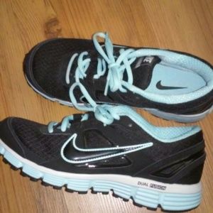 Black and teal Nike tennis shoes