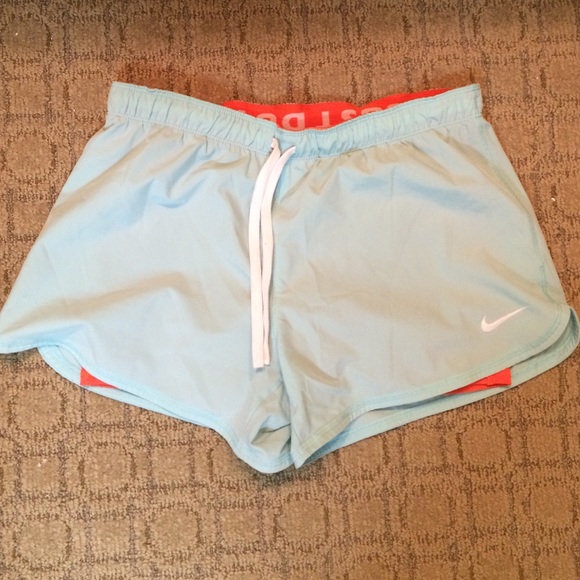 Light blue and coral Nike Dri-Fit shorts