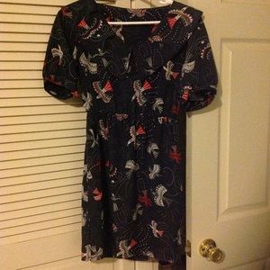 Blue dress with birds design