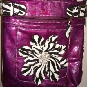 Purple and zebra cross body bag