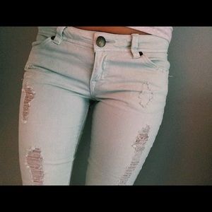light seafoam green skinny jeans with tears!