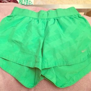 Green Nike drive-fit running shorts