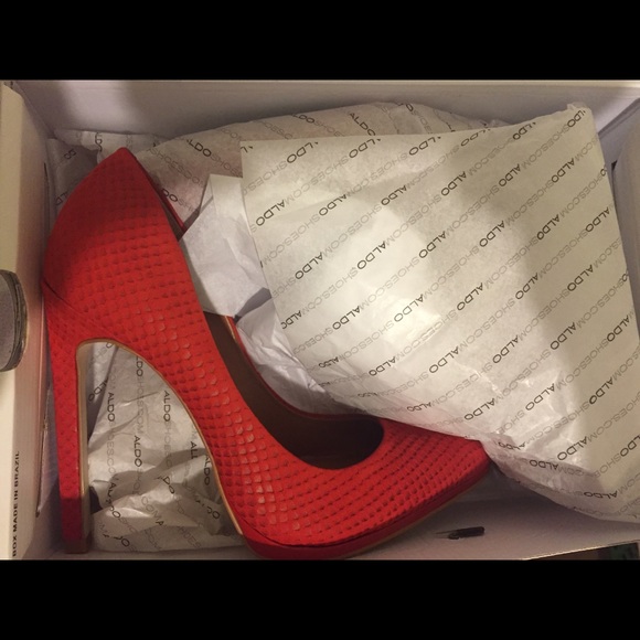 Red Aldo Pumps
