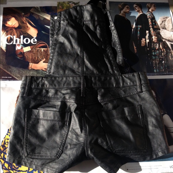 Leather overall shorts .