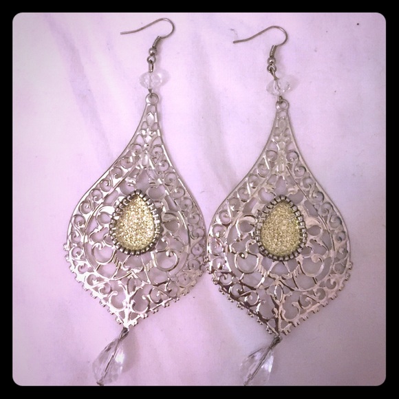 Silver earrings.