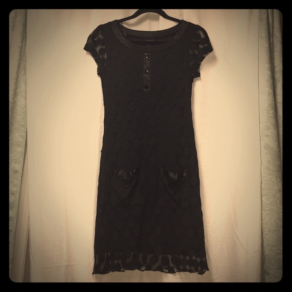 Black polka dot form fitting short dress