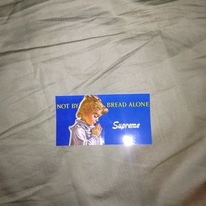 Supreme "Not by bread alone" sticker
