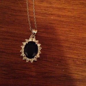 Middle is more of a navy blue. Stone necklace