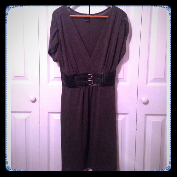 A cute gray dress with a black belt.