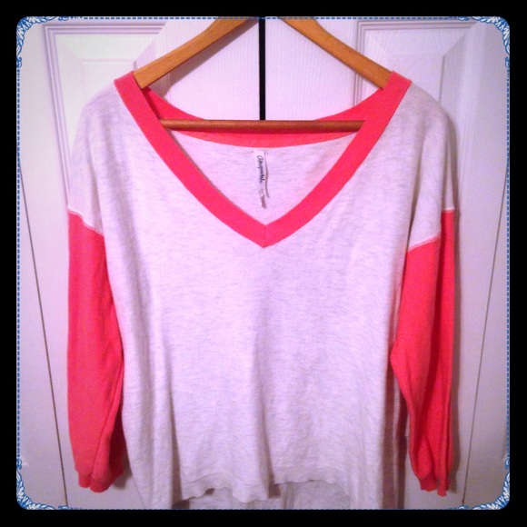 Tan and bright pink shirt