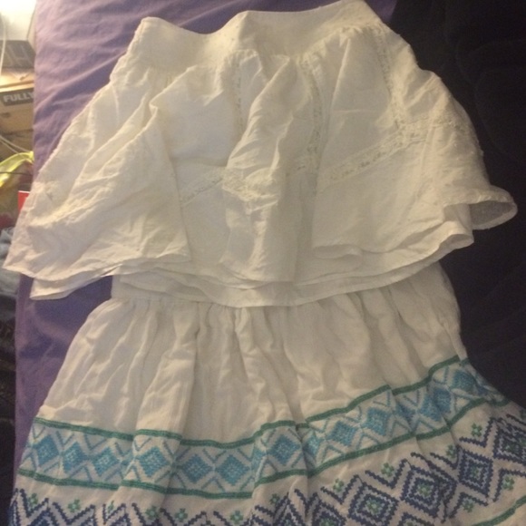 2 white circle skirts
