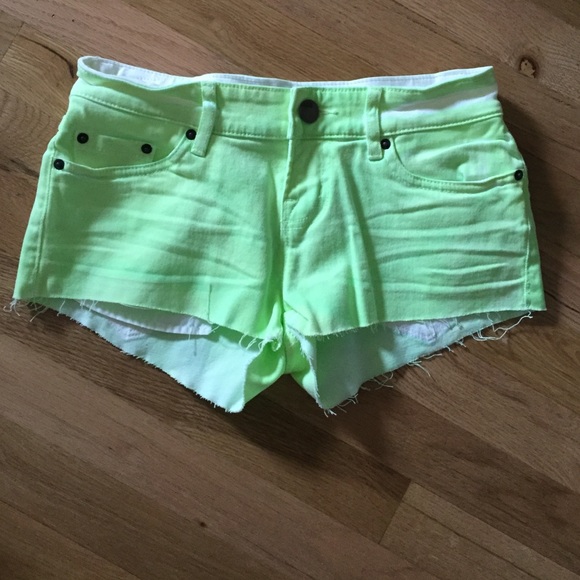Neon green jean shorts
