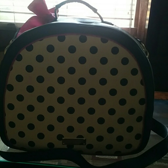 "Carry on"  luggage bag by Betsey Johnson