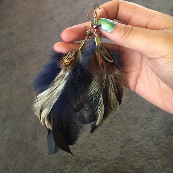 Never worn fluffy feather earrings!