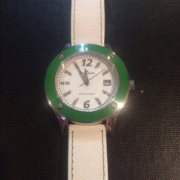 White leather watch with large, bright green face