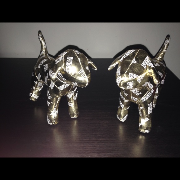 Two limited edition  pink gold dogs