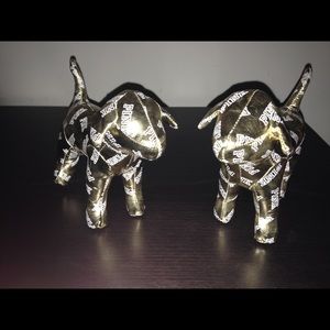 Two limited edition pink gold dogs