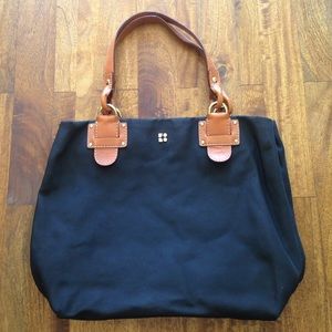 Kate Spade black tote with leopard lining