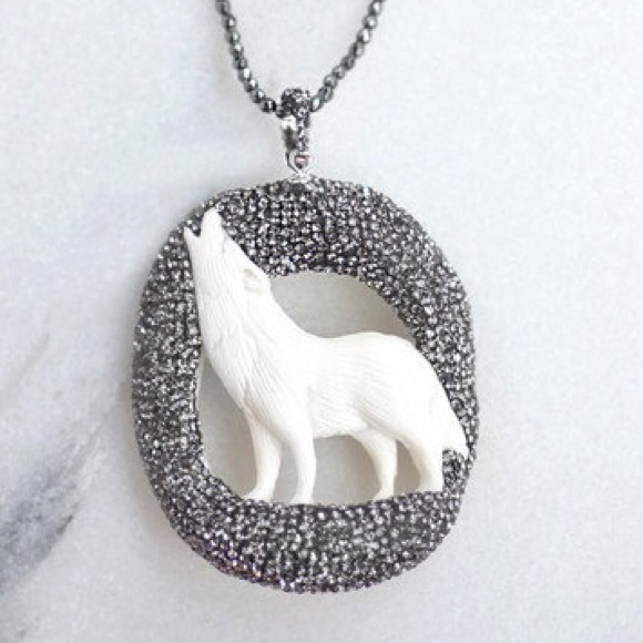 Carved Howling Wolf Pendant with Crystals