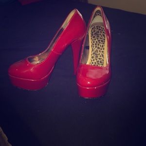 Red patent leather platform heels