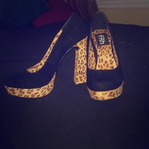 Black and leopard print suede platforms