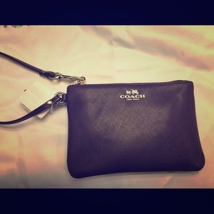 Purple Saffiano leather coach clutch