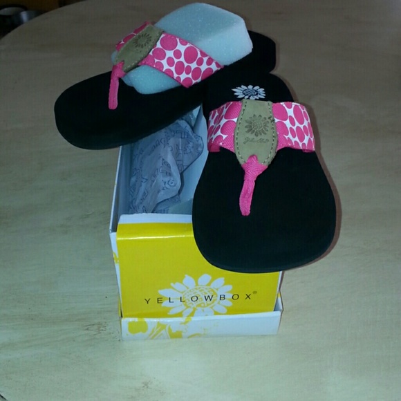 NEW never worn yellowbox flip flops.