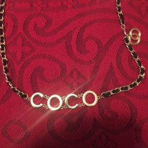 Goldtone chain belt.