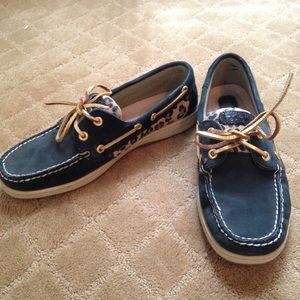 Black and gold Sperry Top-Sider shoes