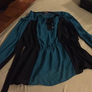 Plus sized Green and black peplum top gently used