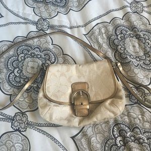 Gold coach cross body