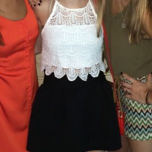 white crop top and black flowy mini skirt